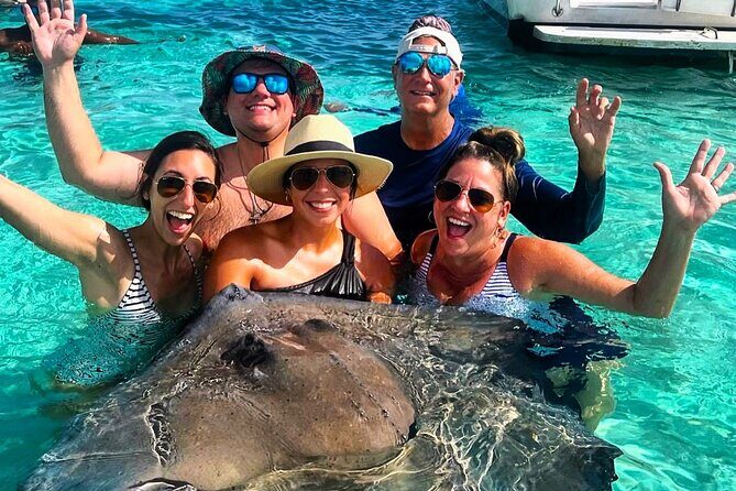 Private Charter 34ft Express Cruiser Stingay City Reef Snorkeling - A private 34-foot cruise that feels like a local plan