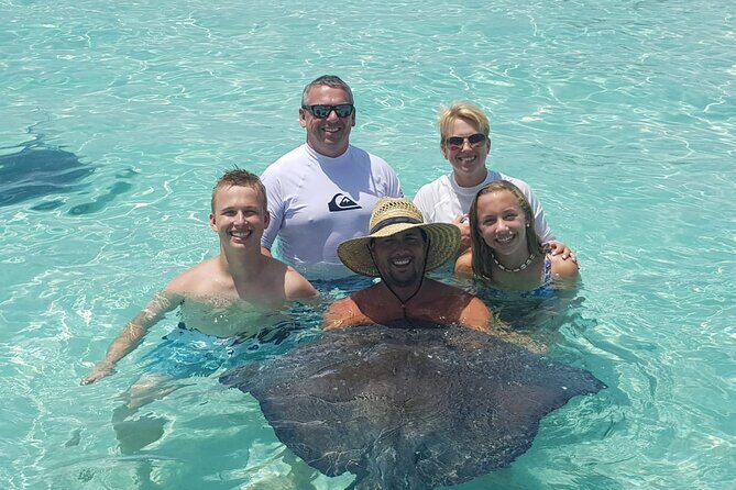 Private Charter 34ft Express Cruiser Stingay City Reef Snorkeling - Fishing rods, sea-life spotting, and the extras that make it feel worth it