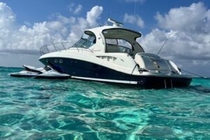 Private Luxury HalfDay w/Jetski Stingray City, Snorkeling & Starfish Beach Tour - Getting on the Boat at Island Splash Watersports and Yacht Club Access