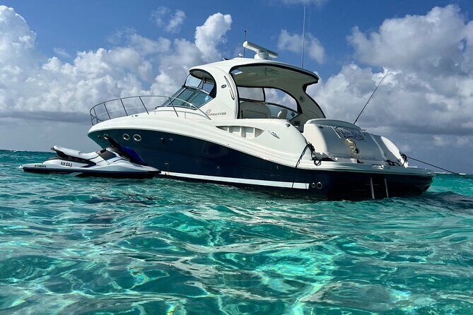 Private Luxury HalfDay w/Jetski Stingray City, Snorkeling & Starfish Beach Tour - Getting on the Boat at Island Splash Watersports and Yacht Club Access